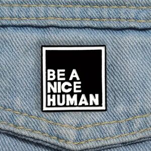 Black and White 'Be a Nice Human' Pin